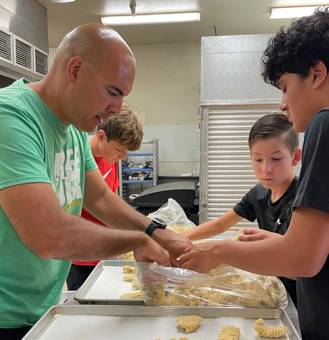 Volunteers helping in the kitchen